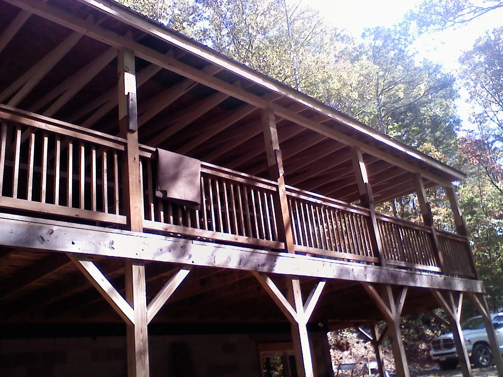 Timber framing under a new elevated porch and deck — Roof Leak Repair in Fairbanks by Roofing Brothers